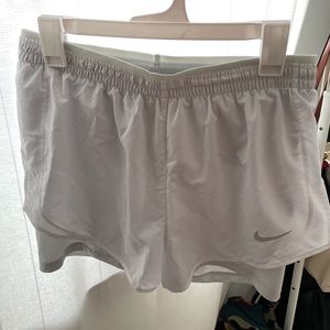 White nike running shorts with grey compression